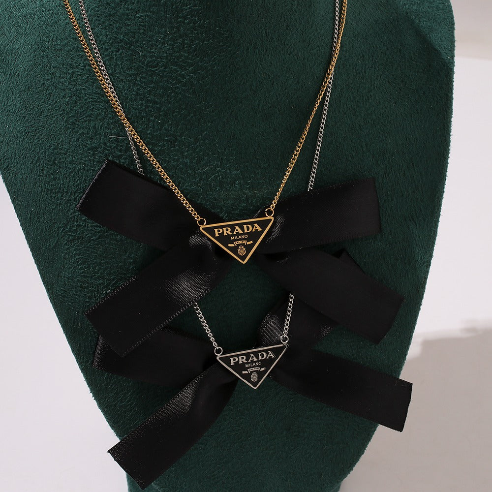Prad bow necklace